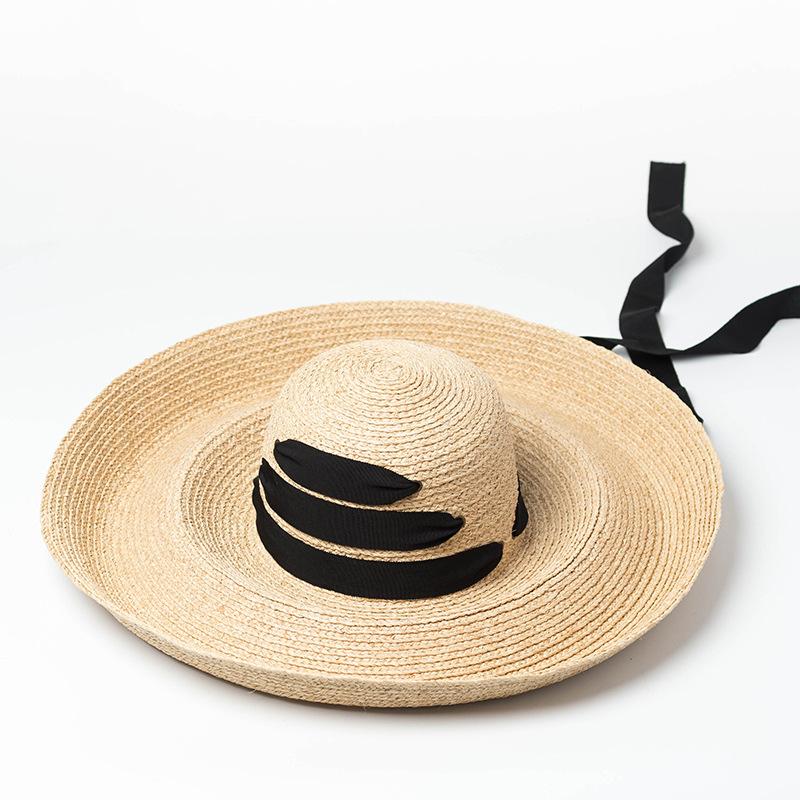 European and American fashion retro dome hemming strap big eaves Lafite straw hat outdoor shading catwalk big edge beach straw hat