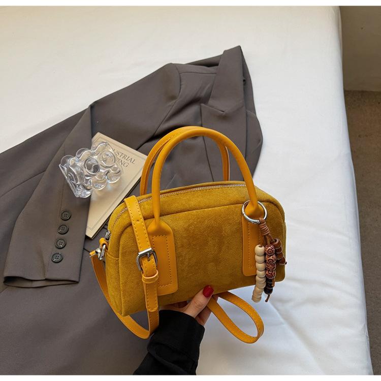 Vintage matte handbag women's 2025 new niche bowling pillow bag commuter shoulder messenger bag