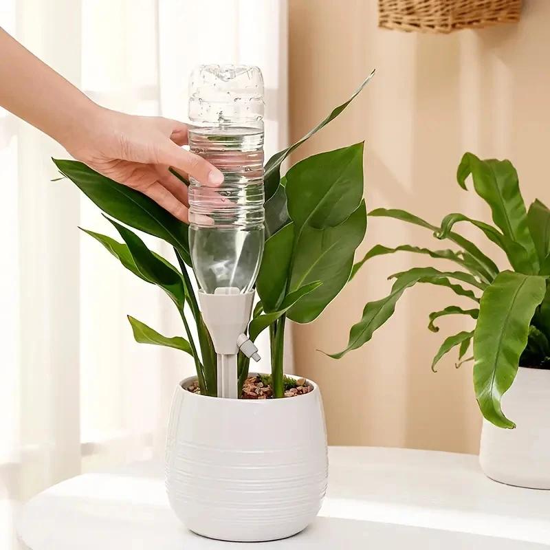 Automatic flower watering device for home potted plants, adjustable drip speed when going out, automatic irrigation dripper