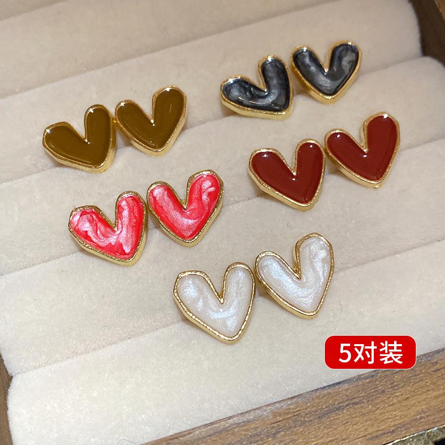 

Silver needle dripping oil love stud earrings women s retro light luxury Hong Kong style temperament versatile earrings niche high-end earrings