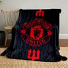 A Red Manchester United Emblem with Tridents On a Black Background. for All Seasons Blanket Lunch Break Throw Gift
