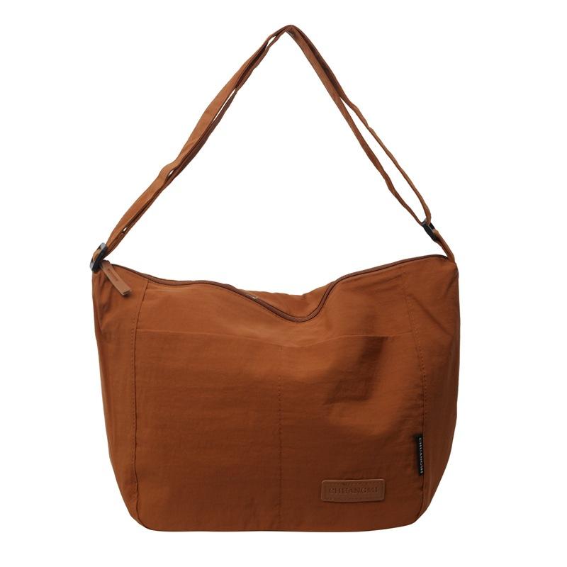 New simple and fashionable large-capacity Japanese solid color shoulder bag versatile casual trend lazy wind messenger bag