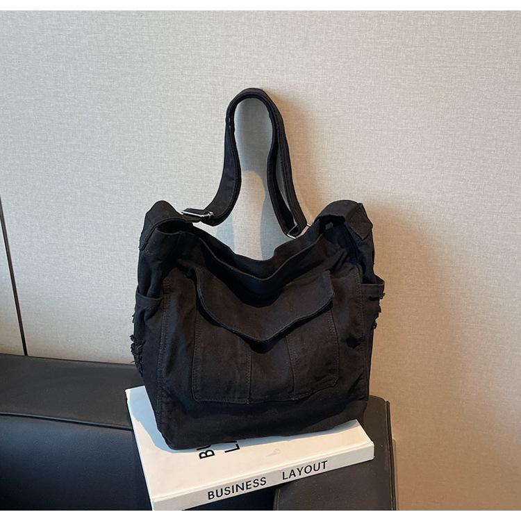 Canvas bag women's large-capacity new summer casual high-end niche lazy wind messenger bag