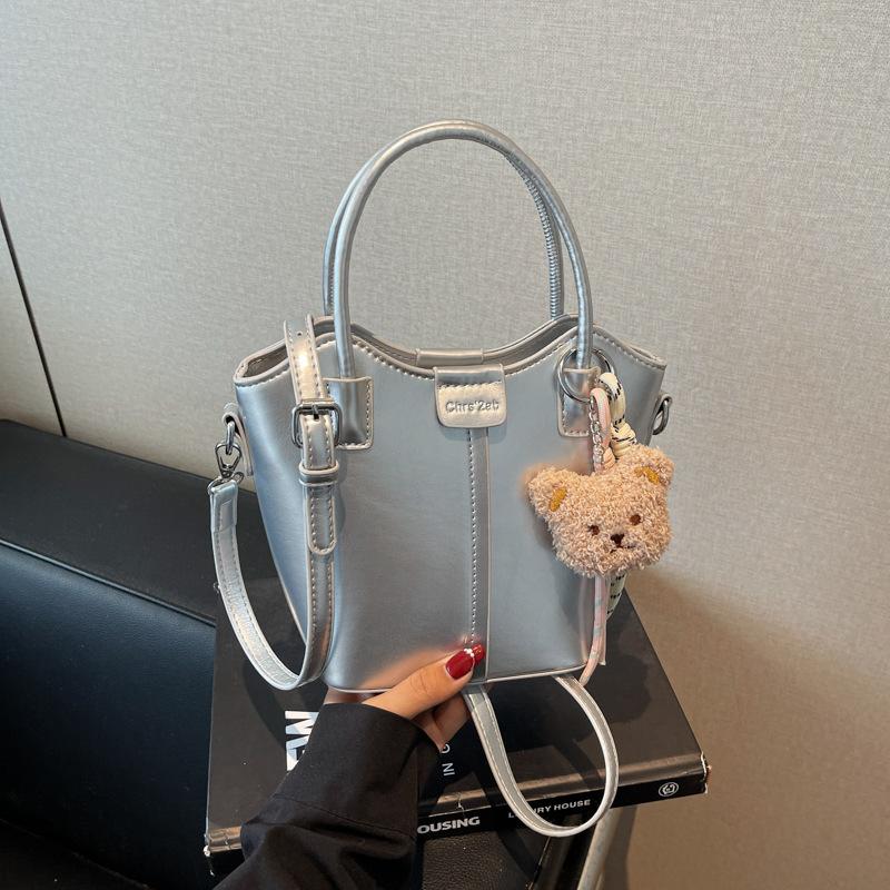 

Ручная переноска модная сумка-ведро женская новая модная простая наплечная сумка нишевая текстура сумка-мессенджер женская серебряный