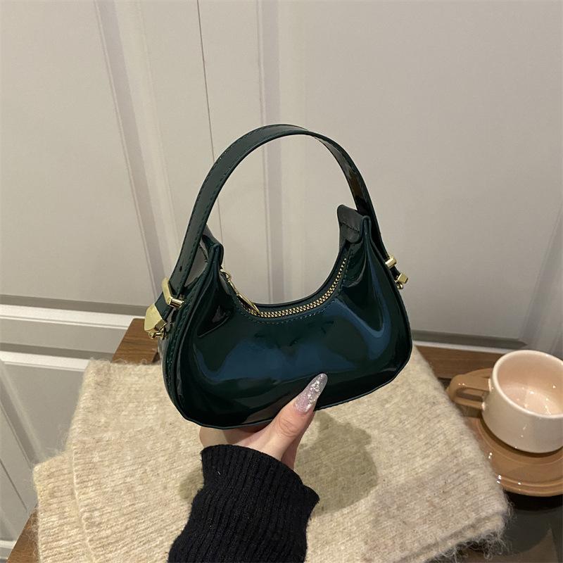 Höst nisch enfärgad bärbar halvmåneväska ny trendig avslappnad textur fashionabel axel armhåleväska