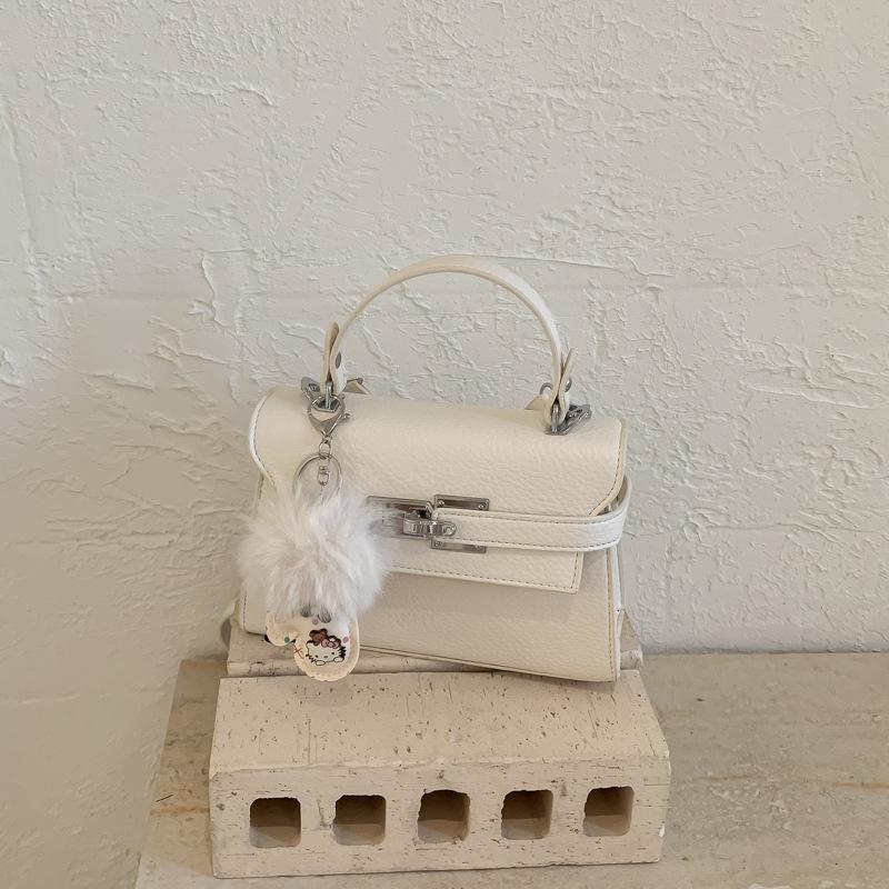 Elegant Commuting Bag for Work with A Chic Kelly Bag Style, Single-shoulder Cross-body Design.