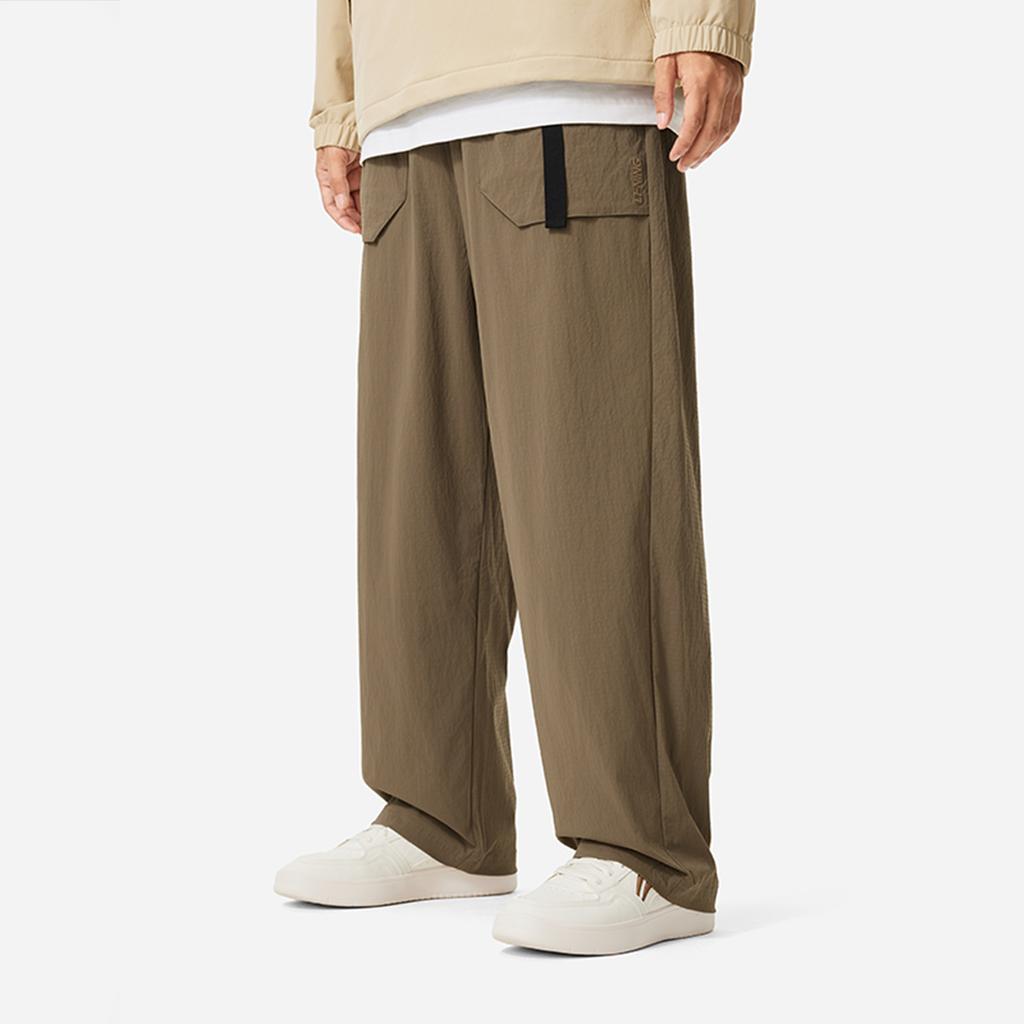 Li Ning Série Lifestyle Sportif Imperméable Couleur Unie Ample Confortable Jambe Large Coupe Droite Taille Moyenne Pantalon Décontracté d'Hiver Homme pantalon AYKUA15-3