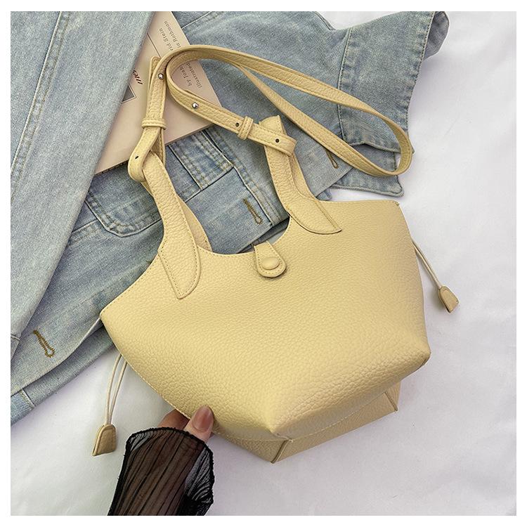 2025 New Versatile Niche Design Vegetable Basket Women's Bag High-end Texture Commuter Portable Messenger Bag Women's Trend