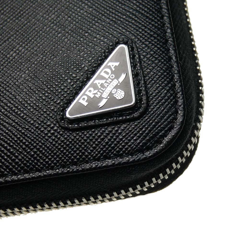 Dlouhá peněženka s kulatým zipem, reliéfní kůže 2ML317 QHH F0002 černá [Prada] Pánská [Položka]
