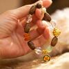 Agarwood & White Crystal Imitation Jade Bracelet with Exquisite Carving Design