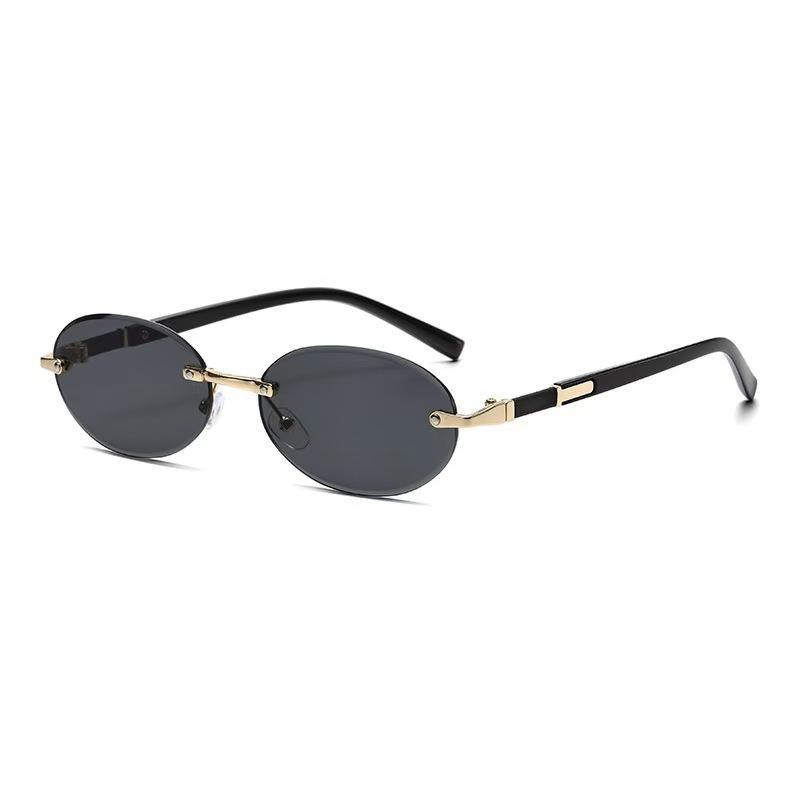 

Sunglasses Personality Versatile Trend Retro Women s Oval Metal Frameless Trimmed Sunglasses