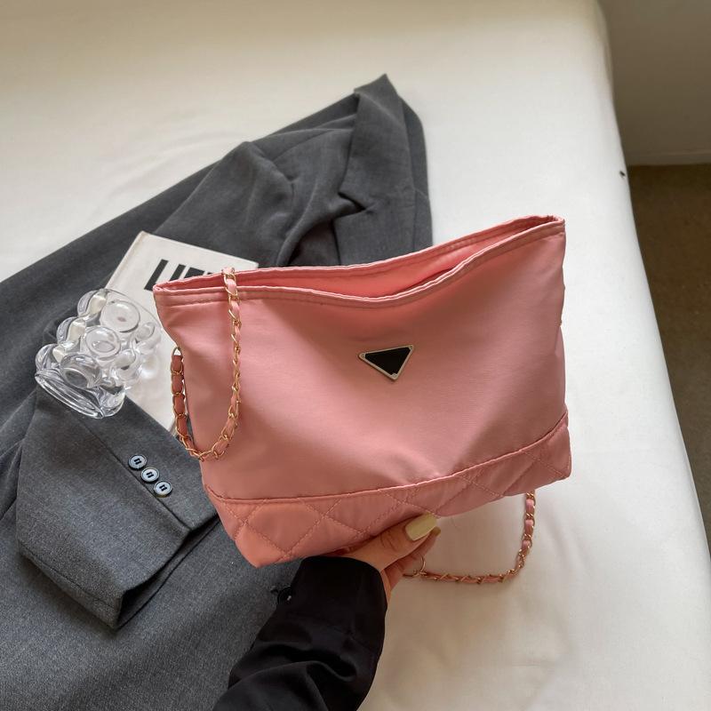 

Beautiful casual shoulder messenger bag, popular personality bucket bag this year, women s 2024 new fashion commuter chain bag рожевий