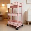 Compact Rolling Trolley: Floor-Standing Multi-Layer Storage Rack for Living Room & Snacks.