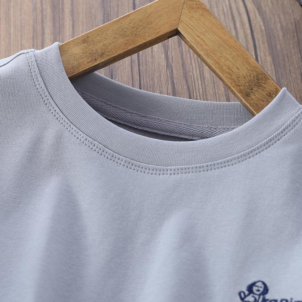 2025 Outono Infantil Gola Redonda Manga Comprida Cor Sólida Camiseta Base