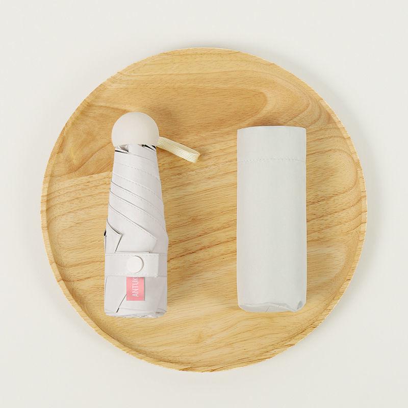 Parasol Capsule Sun Umbrella: 50% Off Mini UV Protection for Women, Dual-Purpose for Sun and Rain.