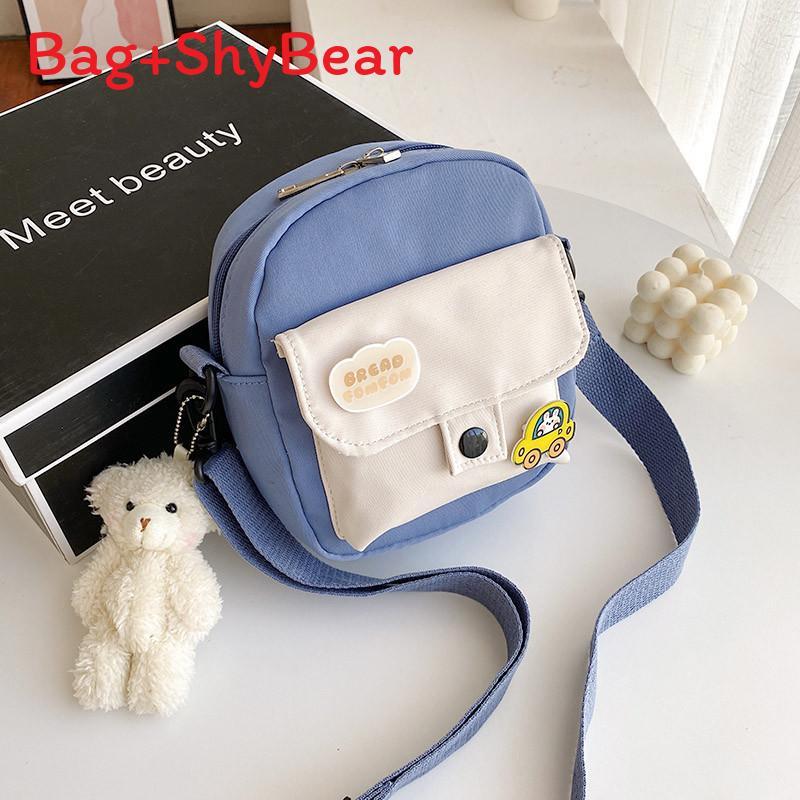 Piccola borsa a tracolla da donna in tela con tasca per cellulare e design a blocchi di colore, ideale per l'uso quotidiano.