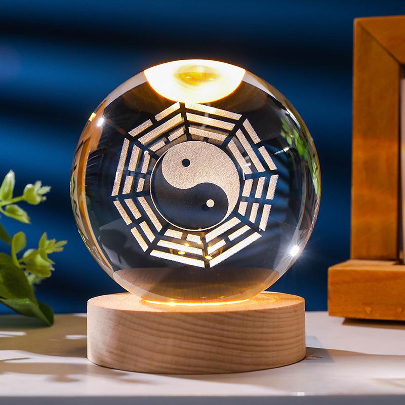 Flickering Crystal Ball Night Light with Engraved Solid Wood Base - Perfect as a Birthday Gift or Creative Graduation Ornament.