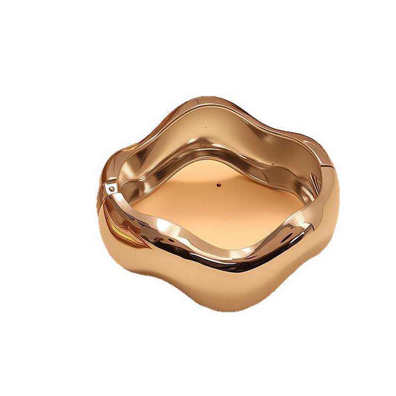 European & American Asymmetrical Glossy Fashion Bracelet with Curved Design