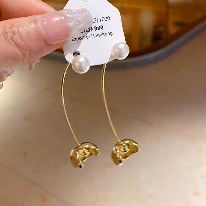 

Silver Needle Flower Pearl Earrings Temperament Fashion Design Sense Earrings Personality Light Luxury Versatile Premium Earrings