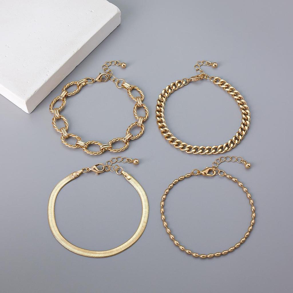 Versatile Four-Piece Multi-Layer Metal Chain Bracelet Set for Women - European and American Fashion