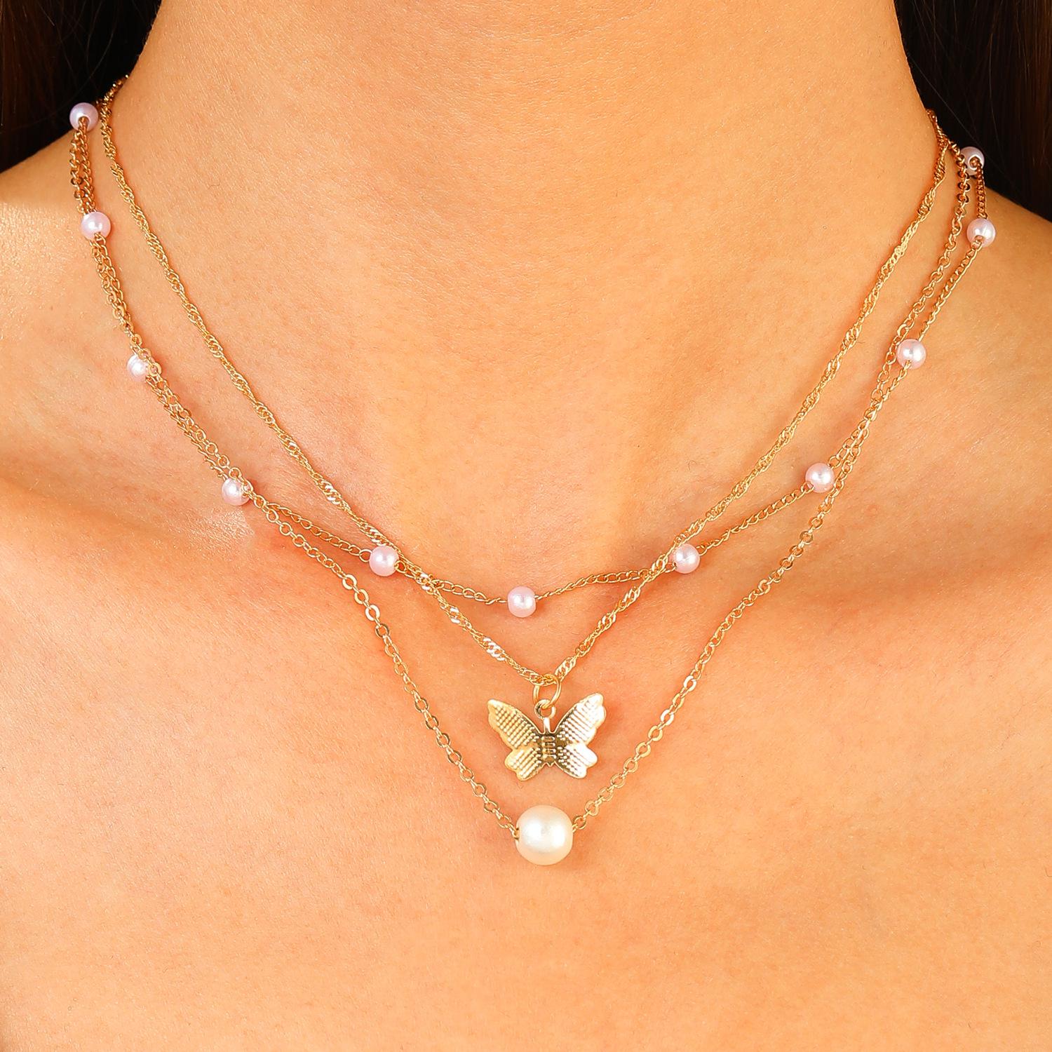 

European & American Style Pearl Butterfly Necklace: Multi-layer Clavicle Chain for Women