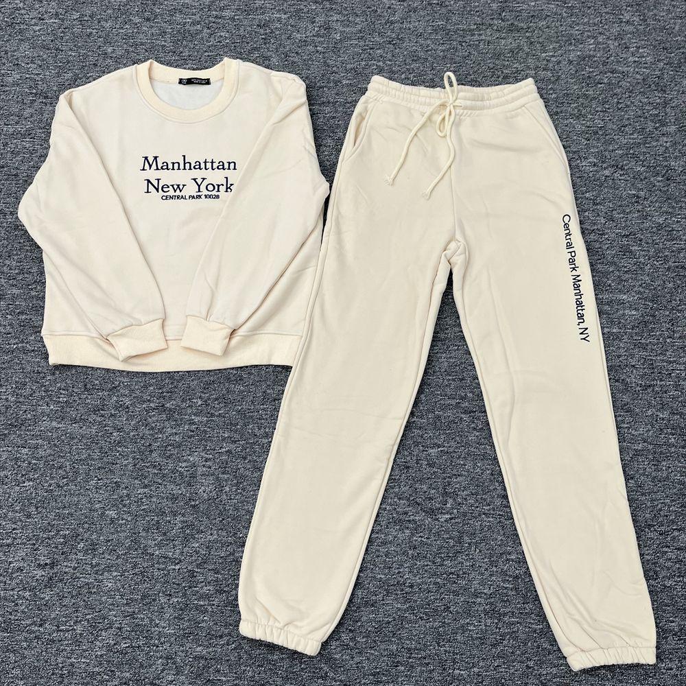 

Женский повседневный спортивный вышитый свитшот с круглым вырезом и длинные брюки, комплект Осень/Зима 2024 Medium кремовый