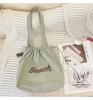 Einfarbige Damen Strand-Schultertasche mit Buchstaben-Design, Damen-Tote aus Canvas, Große Kapazität, Kordelzug, Damen-Einkaufstasche