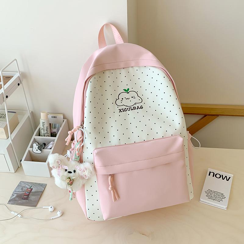 Schoolbag schoolbag junior high school girl cute girl heart polka dot backpack large capacity college student 1011 new backpack