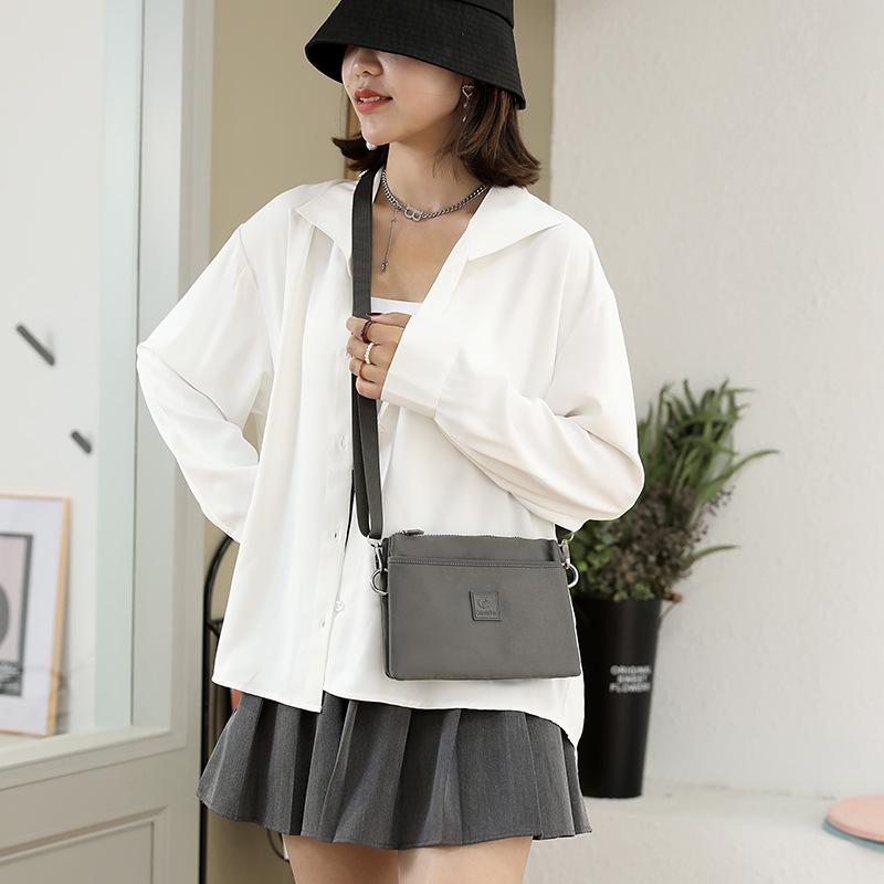 

Women s bag, new casual women s shoulder bag, solid color simple messenger bag, casual nylon bag, mobile phone bag for women чорний