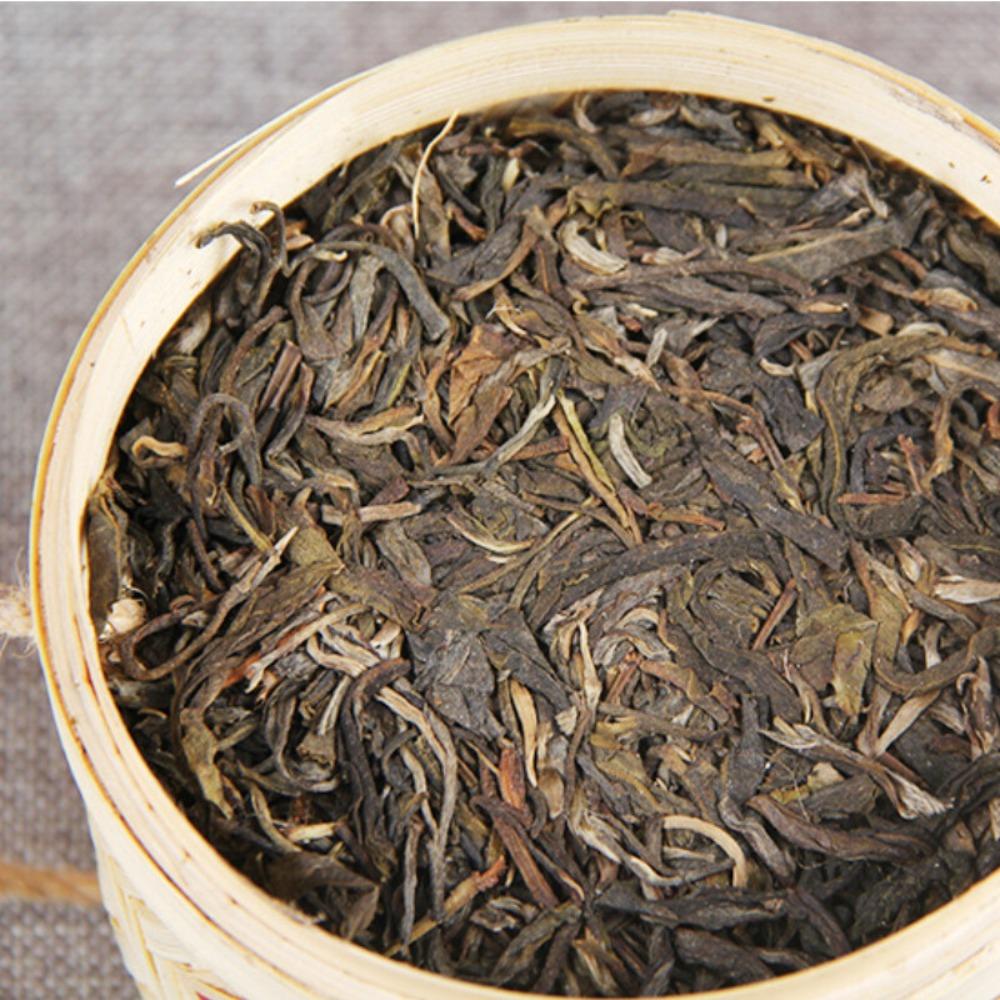 

Yunnan Pu er Tea Cake 500g Natural Fermented Loose Tea Bamboo Gift Box 01