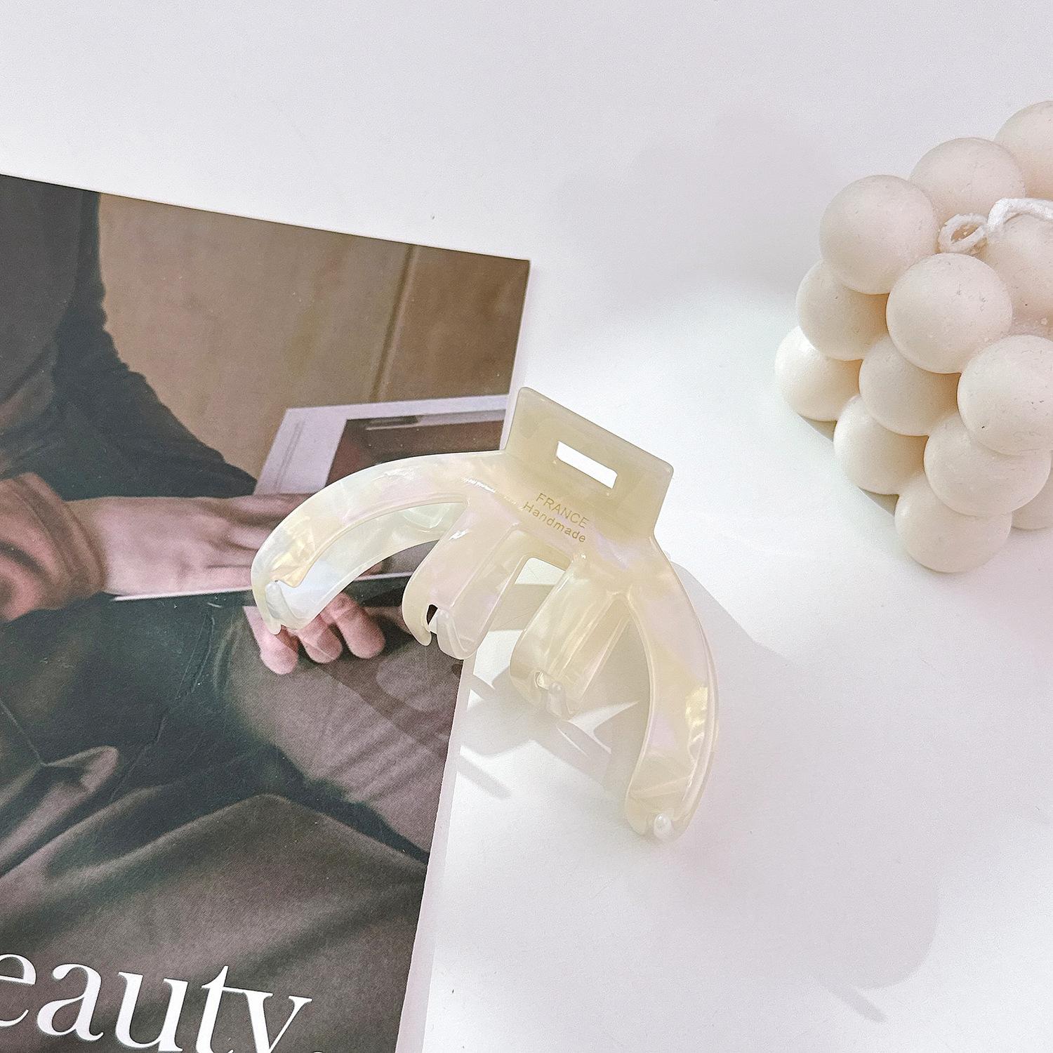 

Ацетатная классическая дугообразная заколка-краб для волос черного и карамельного цвета, идеально подходящая для повседневного использования женщинами Colorful White 8.3cm