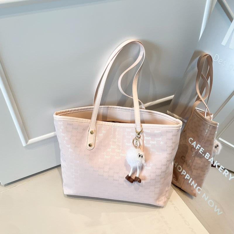 

Tote bag large capacity letter women s bag simple commuting fashion foreign style shoulder handbag 2025 new bucket bag Without pendant розовый