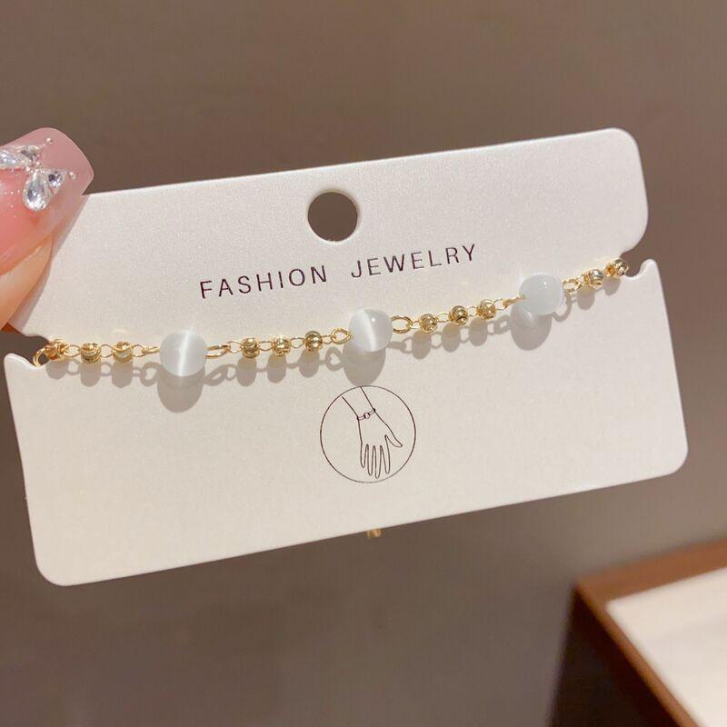 Adjustable Pull-Through Cat Eye Stone Bracelet With Moon Star Motif Gold Plated Copper Women Fashion Jewelry