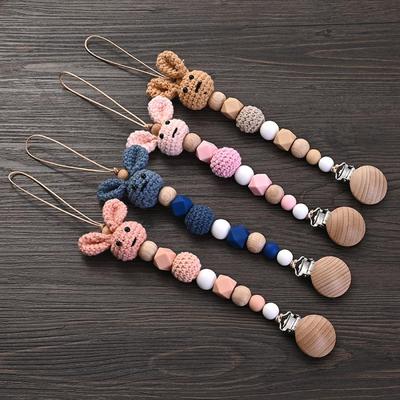 Babypflege – Schnullerclips & Halter