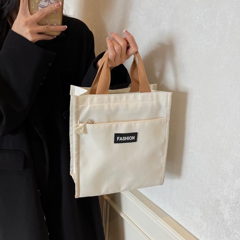Hand Carry Office Workers Lunch Box Bag Waterproof 2025 Autumn Niche Design Foreign Style Casual Fashion Solid Color Handbag