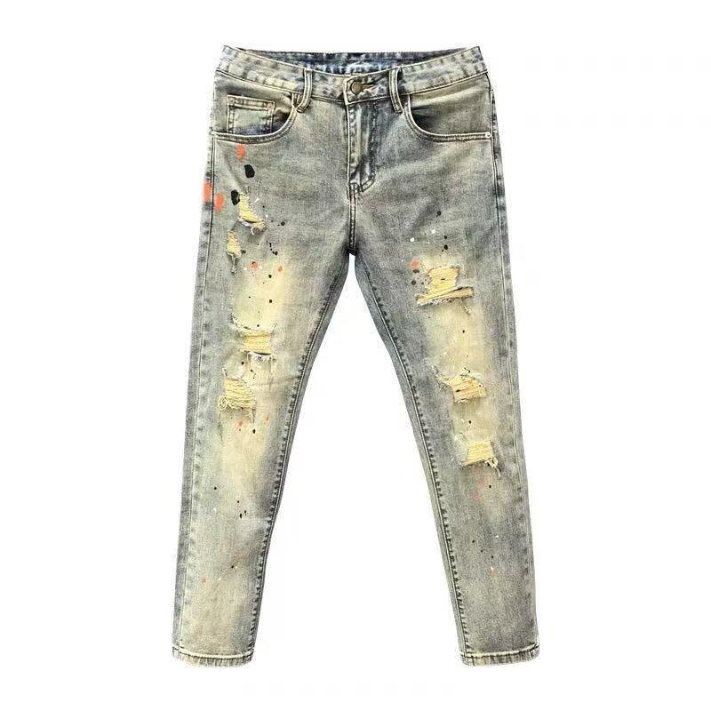Ruffian handsome hole splashing ink light-colored thin jeans men's Korean version slim-fitting nine-point pants new men's pants
