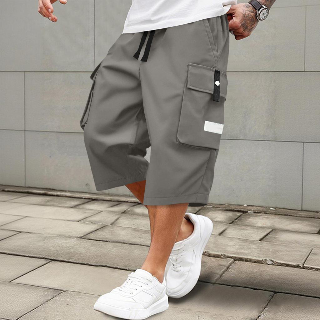 Men's casual and fashionable lace-up lightweight and breathable sports shorts. Men's loose and large-sized multi-pocket workwear shorts.
