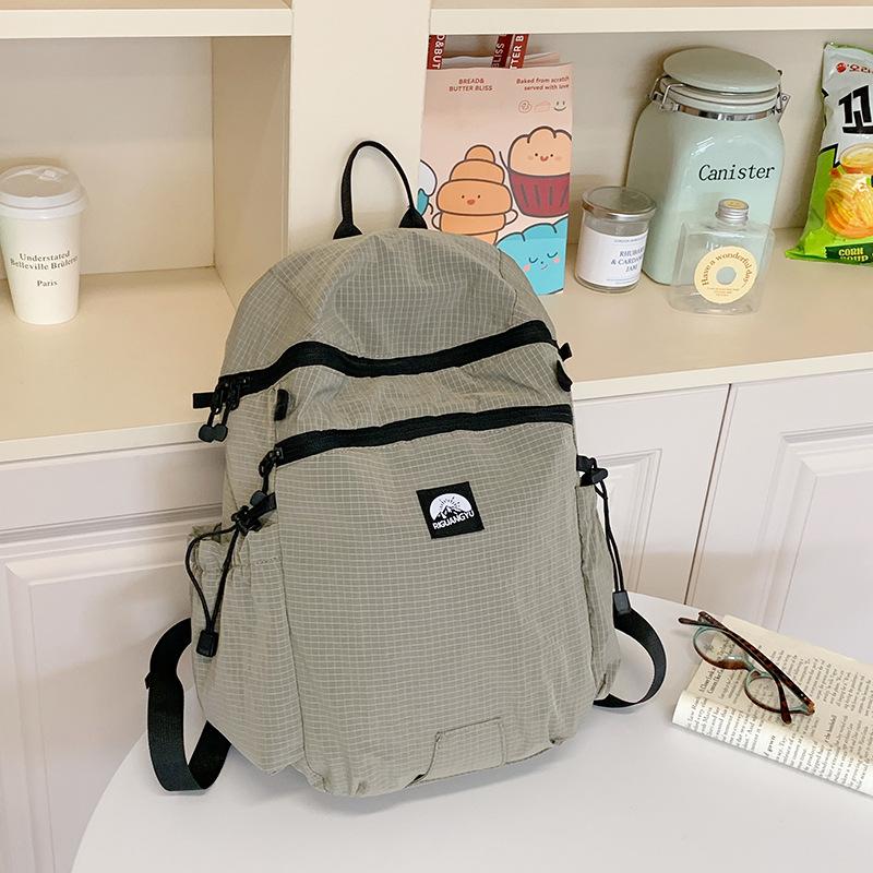 

Backpack Women s Large Capacity New Casual Cloth Bag Handheld Student School Bag Premium Travel Backpack