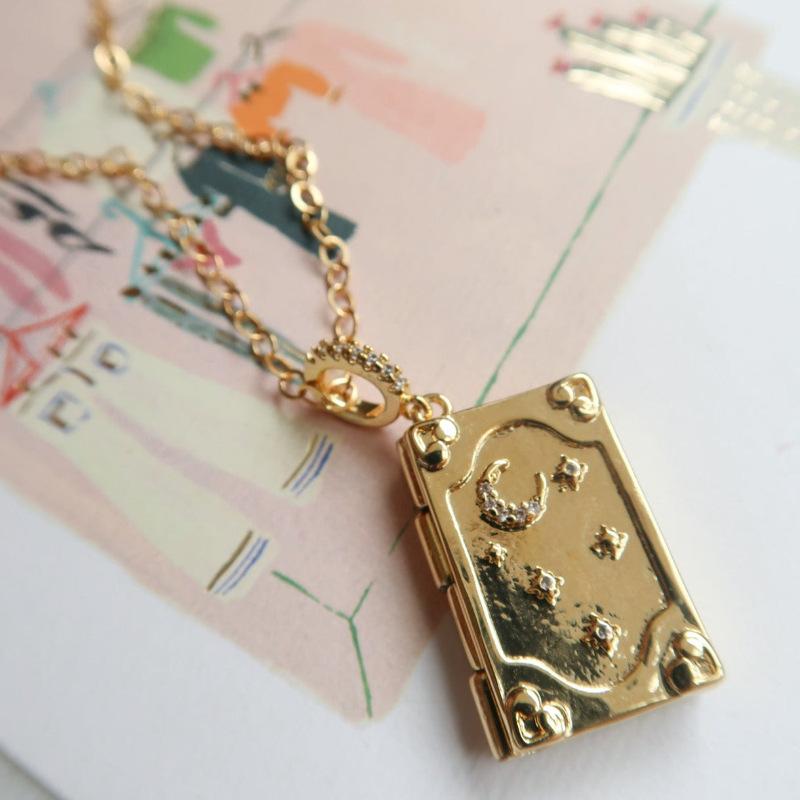 

Golden Star Moon Three-Dimensional Book Necklace Retro Pattern Can Be Opened And Closed Pendant Phase Box Literature And Art
