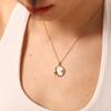 18K Gold Titanium Steel Women's Necklace with French White Mother-of-Pearl Star, Moon, and Round Pendant.