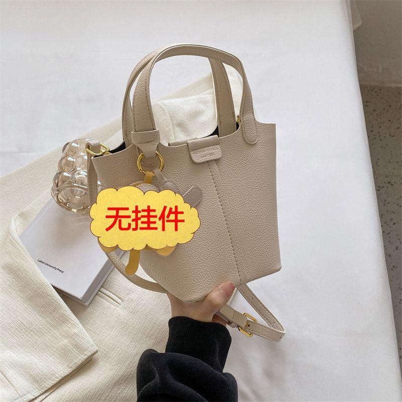 Premium sense bag women's 2025 spring new fashion work handbag solid color texture versatile messenger bucket bag