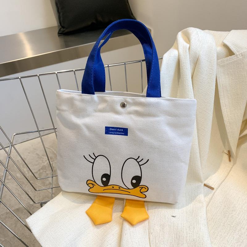 

New duck canvas bag women s shoulder niche cute portable large-capacity student class bag
