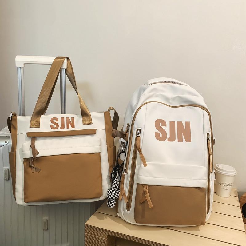 Schoolbag Japanese simple and fashionable backpack 1011 summer new middle school schoolbag college student college style alphabet backpack
