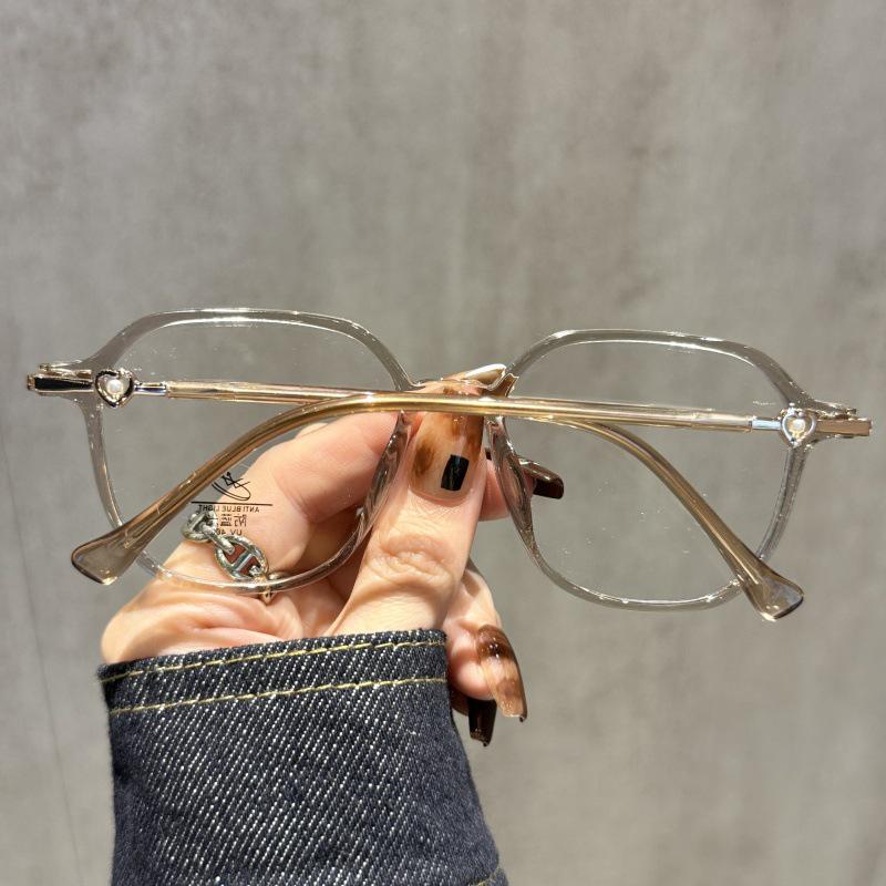 Women’s High-End Myopia Glasses Frame: Cool Tea Color, Anti-Blue Light, Slimming Design, Enhances Fairness, Prescription-Compatible.