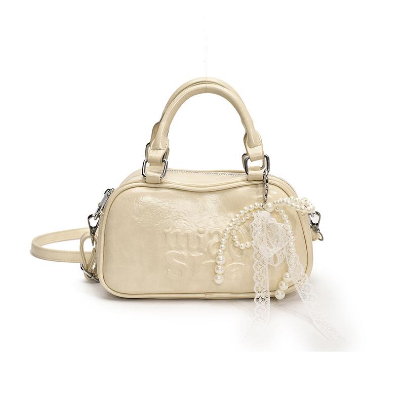 High-end niche bag women's 2025 new PU soft-faced shoulder messenger bag large-capacity trendy portable Boston bag