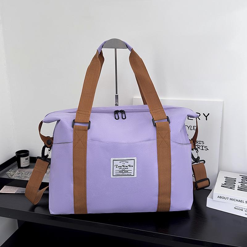 Travel bags for women and men, short-distance luggage storage, large-capacity business travel light travel bags, leisure new portable messenger bags