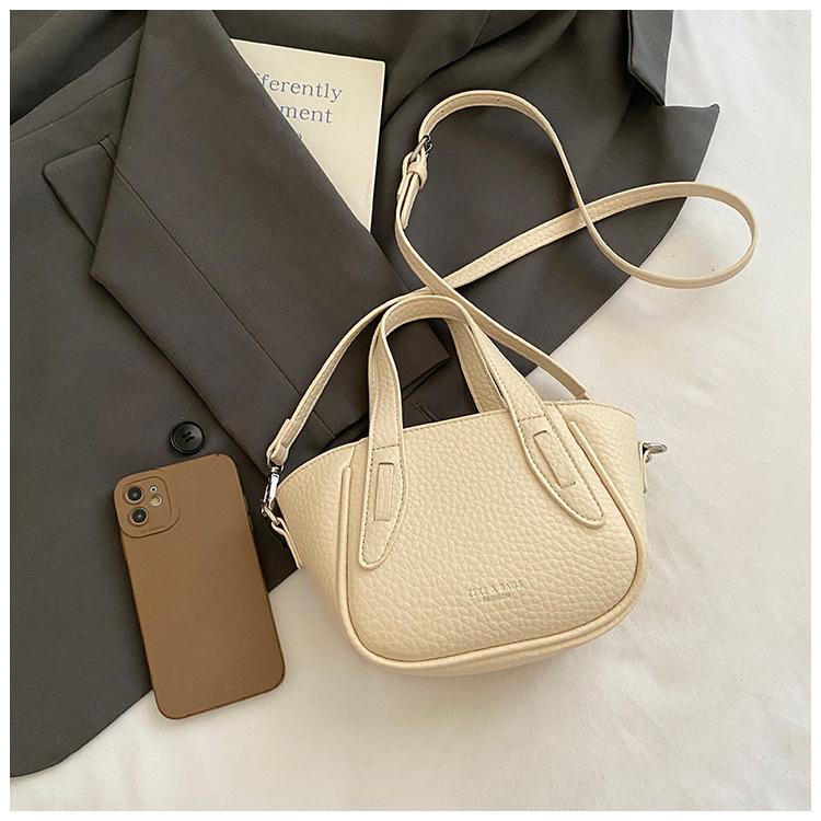 

Корейская весенне-летняя высокотекстурная 2025 новая универсальная сумка-ведро через плечо с узором личи, на одно плечо, кроссбоди, подмышку, для通勤