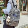 Schultasche Herbst und Winter neuer karierter Rucksack weiblich Koreanischer fauler Stil Pendlerrucksack Grund- und Sekundarschüler Rucksack mit großer Kapazität