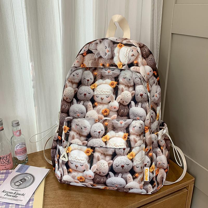 High value, fresh, sweet and cute printed backpack, lightweight make-up class for junior high school students, and large-capacity backpack.