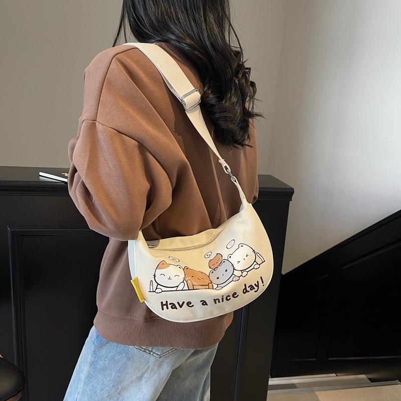 Niche Design Canvas Dumpling Bag Women's New Cartoon Printed Shoulder Bag Versatile Messenger Bag